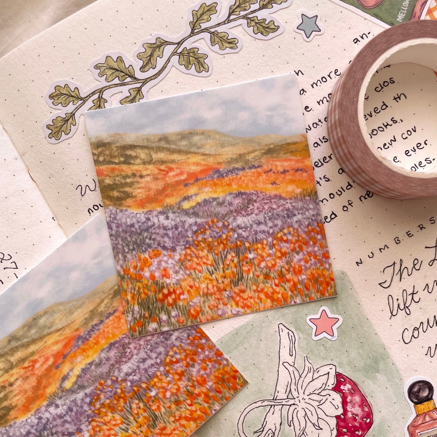 a square, orange and blue floral hills landscape vinyl sticker by mellow days