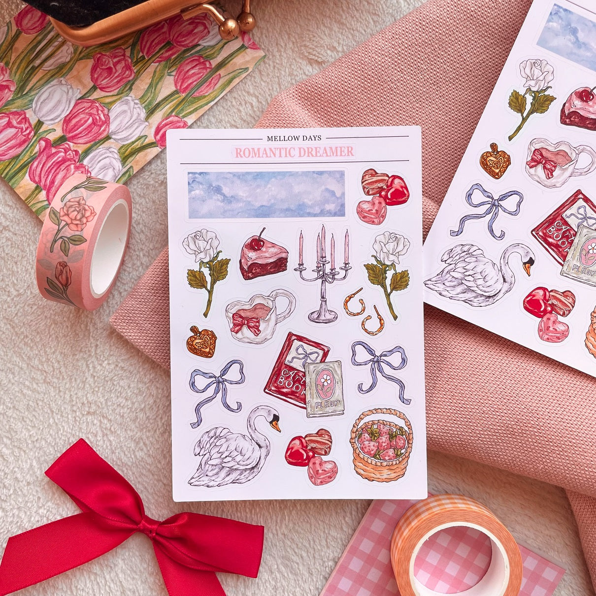 vinyl sticker sheet with a dreamy romantic theme with illustrations of roses, swan, chocolate, strawberries, ribbons, and more