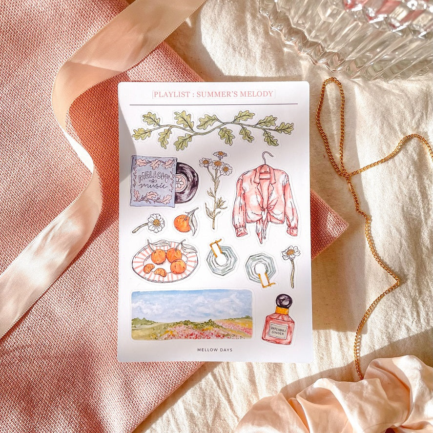 vinyl sticker sheet for bujo, bullet journaling, and stationery planners with Summer theme featuring stickers of leaves, flowers, oranges, vinyl music album, a shirt, earrings, perfume, and a flower landscape